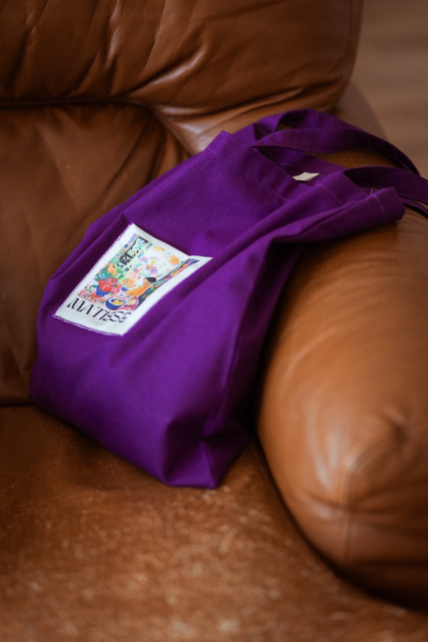 Custodi — borsa con patch artista